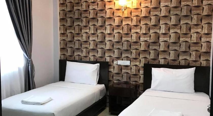 Capital O 90490 Zaques Hotel Sungai Petani Exterior foto